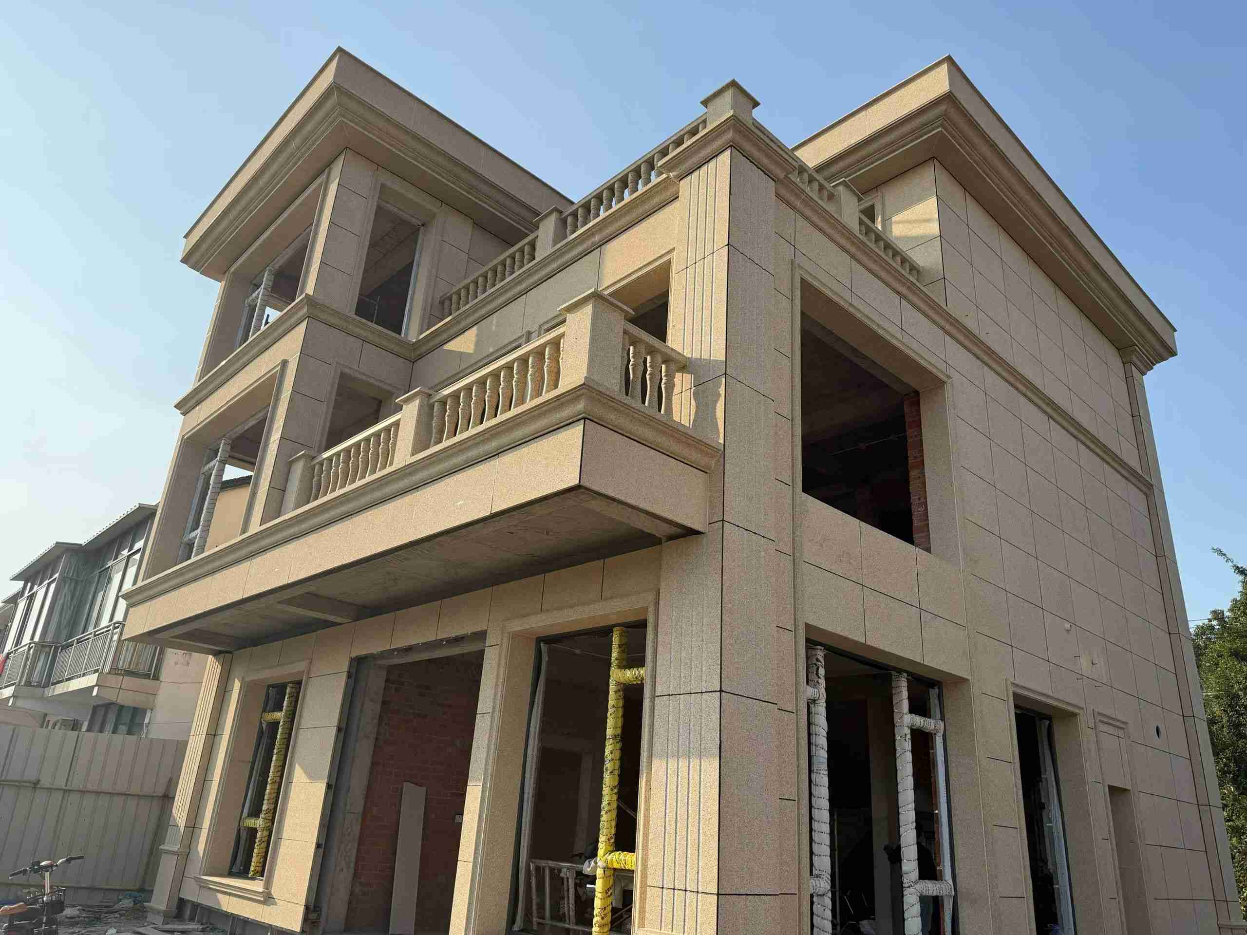 日照 黄金麻花岗岩石材荔枝面外墙干挂效果展示